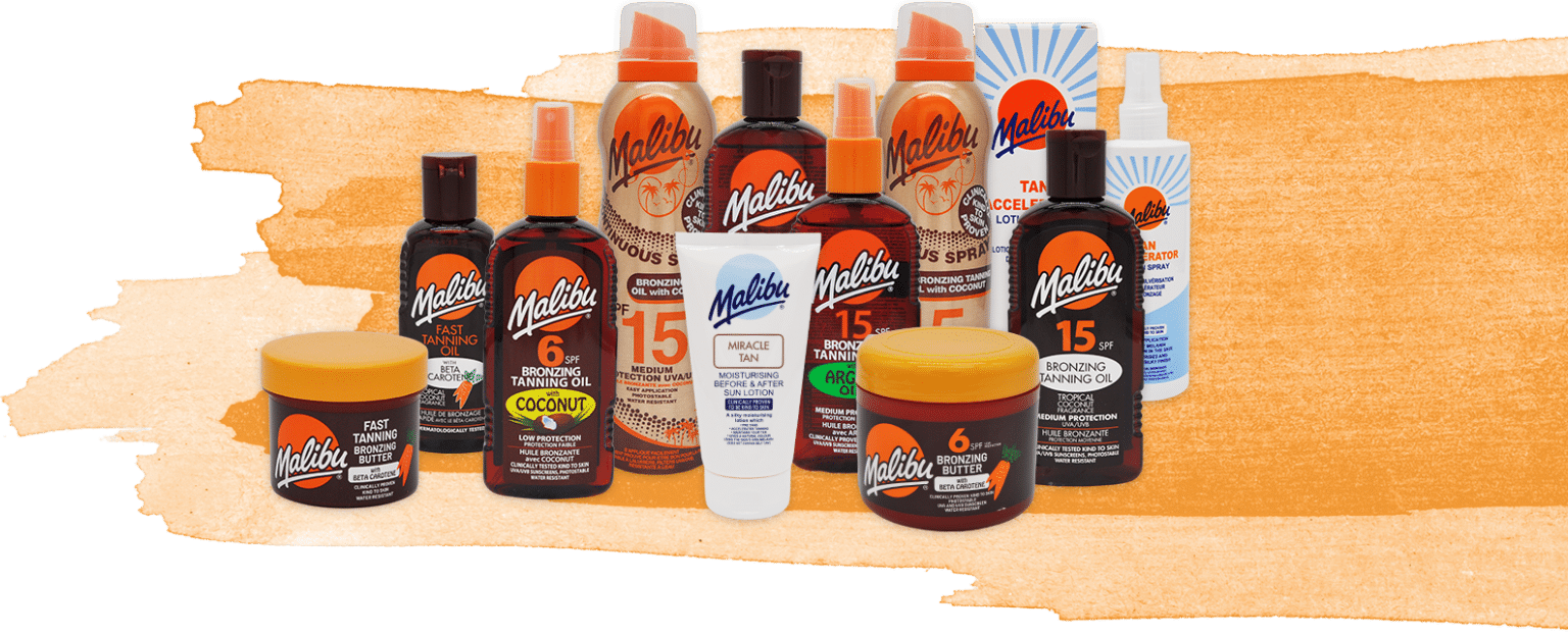 Assorted Malibu bronzing tanning oils and lotions with orange and white packaging